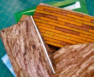 Sue began selecting tree bark, or building fabrics from her stash of fat quarters.